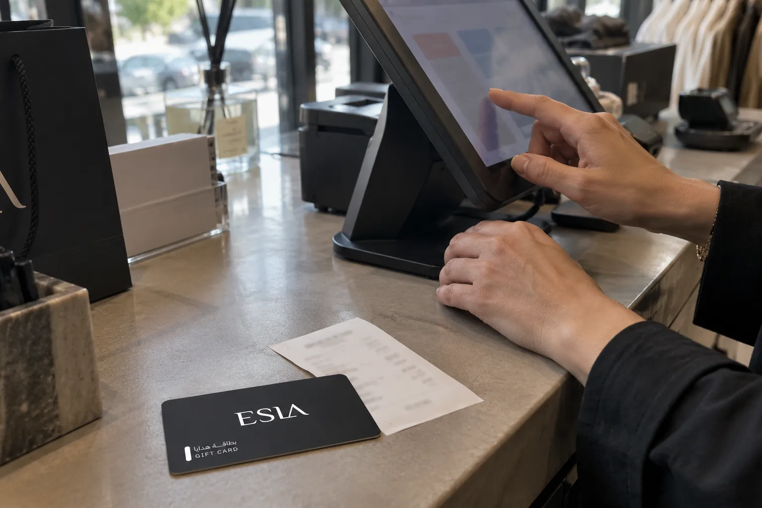 A merchant using a point of sale screen showing the Qboon integration